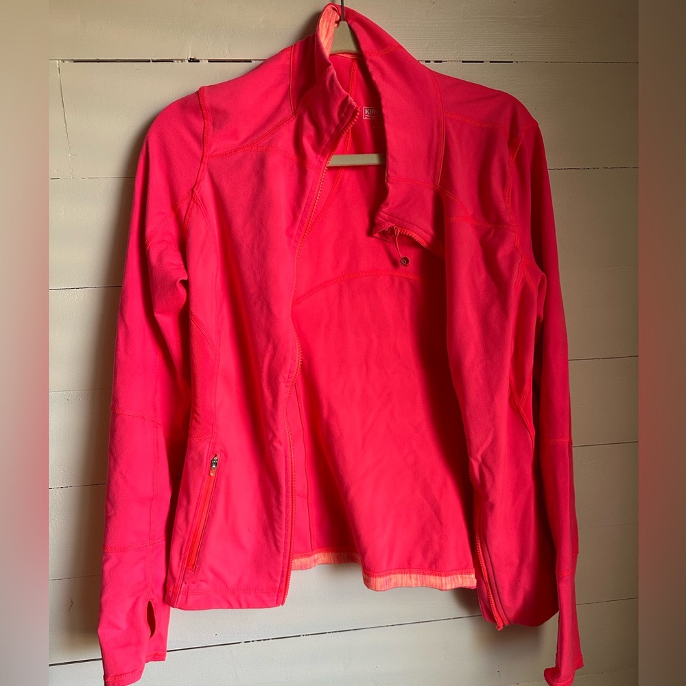 Bright coral stretchy athletic jacket